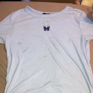 Light blue shirt. Size Xl but can fit small-Xl. Brand is belle tweed